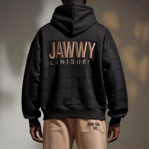 “Luxury black JAWWY full-zip hoodie made from premium matte milton fabric, featuring subtle front embroidery and a large back design with the Eye of Horus and the phrase ‘Own Your Vibe’. A refined, powerful statement piece for confident modern style.”